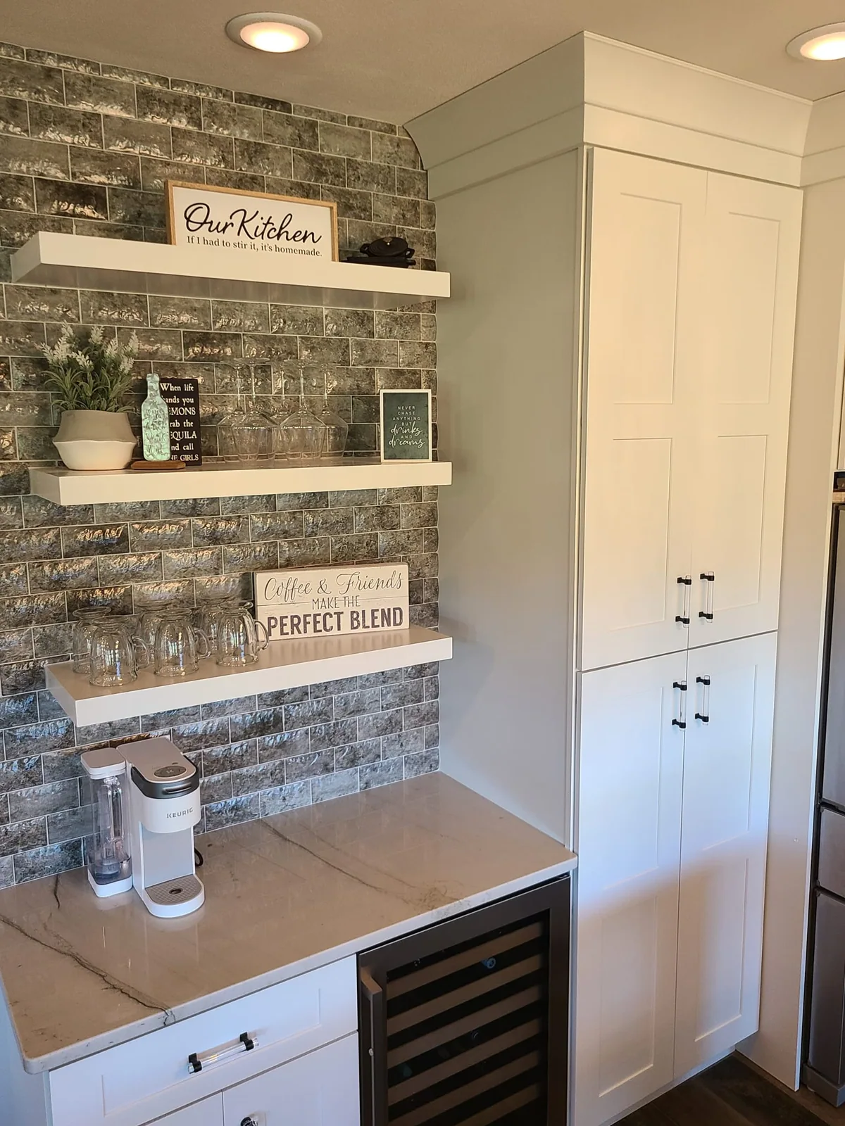 Beverage counter with open shelves and a built-in cooler in Central Square, NY.