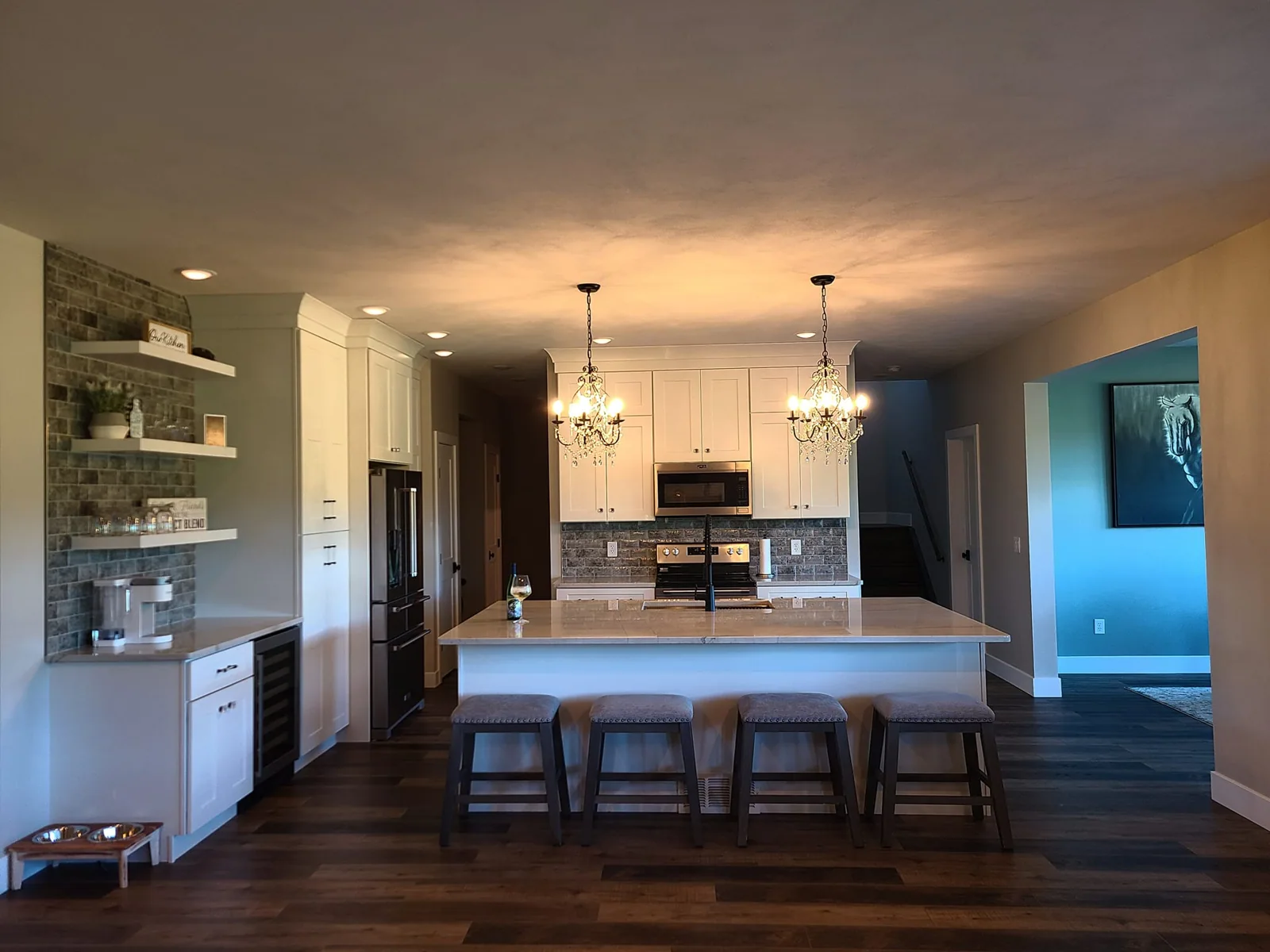 Kitchen and island viewed from the adjoining room in Central Square, NY.