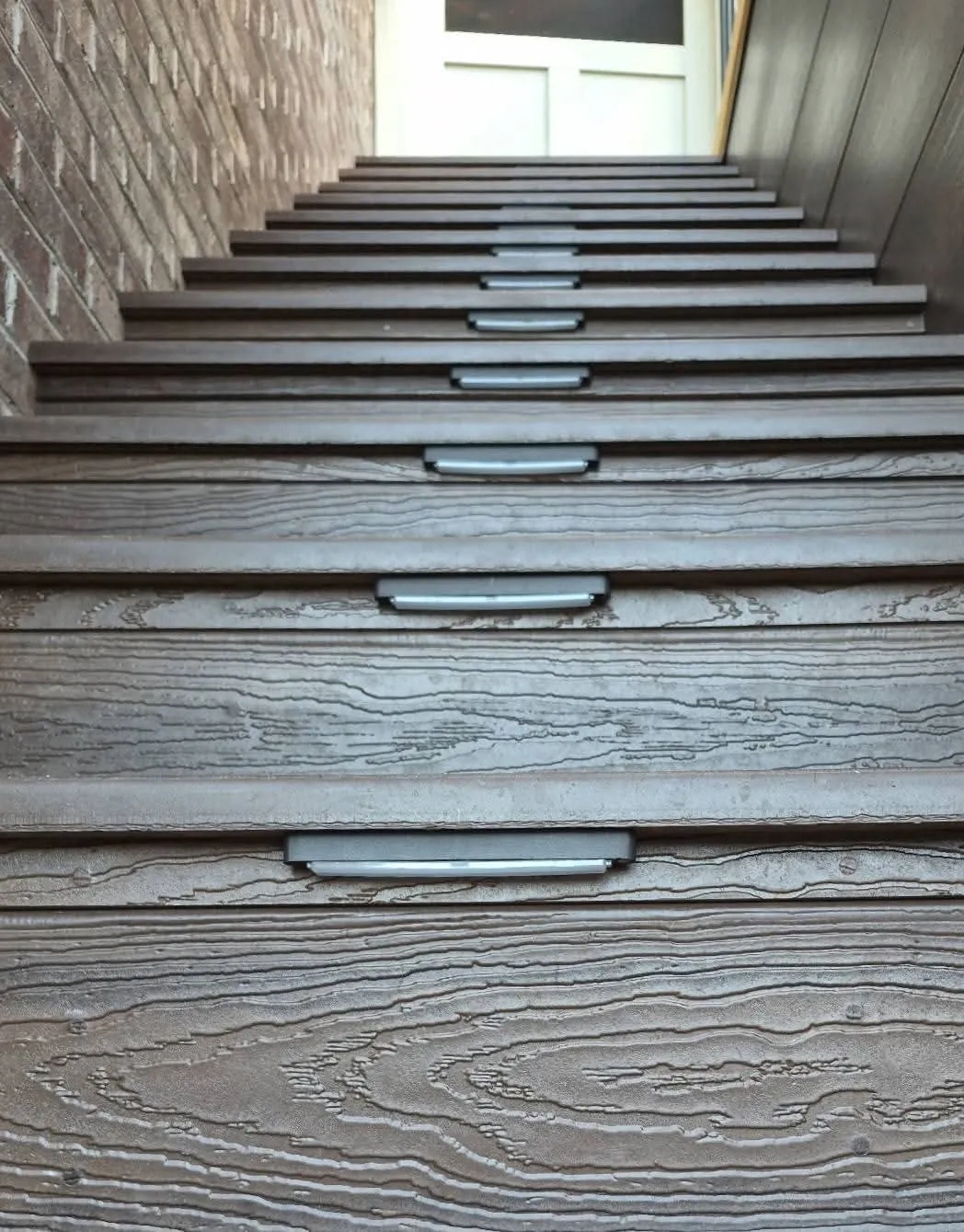 Composite steps with a light set into each riser in Farragut, TN.