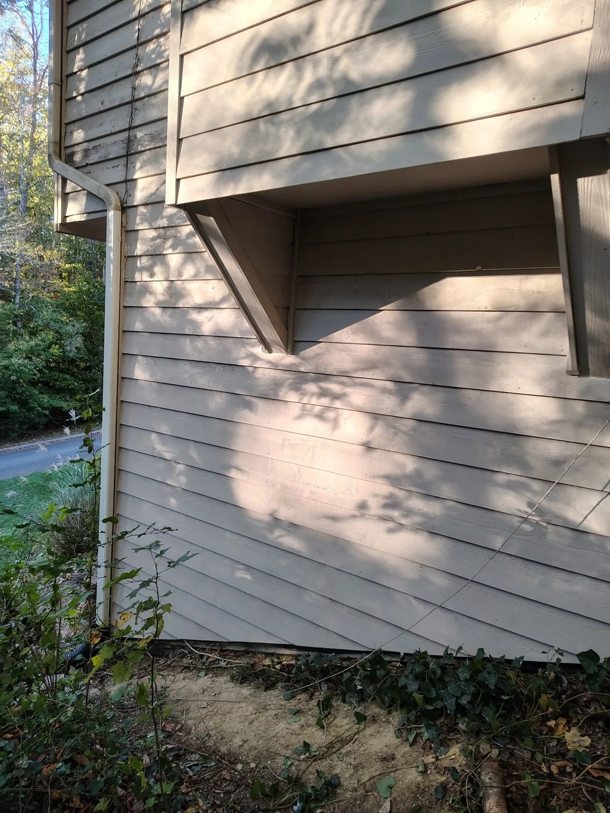 Replacement siding and exterior finish around the repaired opening.